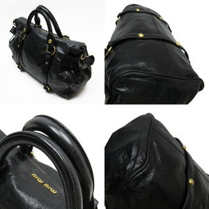 Miu Miu black handbag gold leather